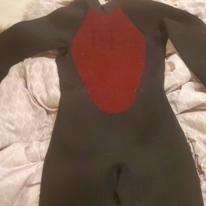 Xcel, size 14 full body suit, black and burgundy